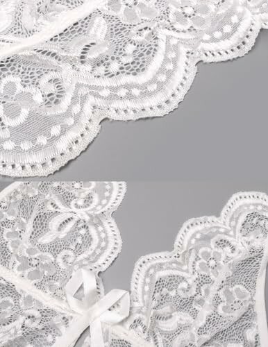 Detalle de encaje blanco sobre fondo gris.